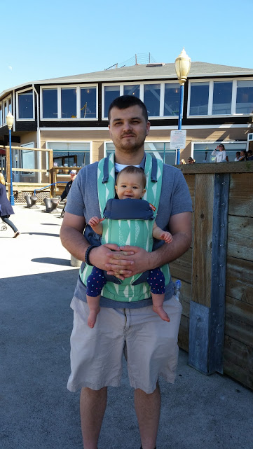 Daddy with his baby in a carrier