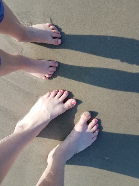 Feet in sand
